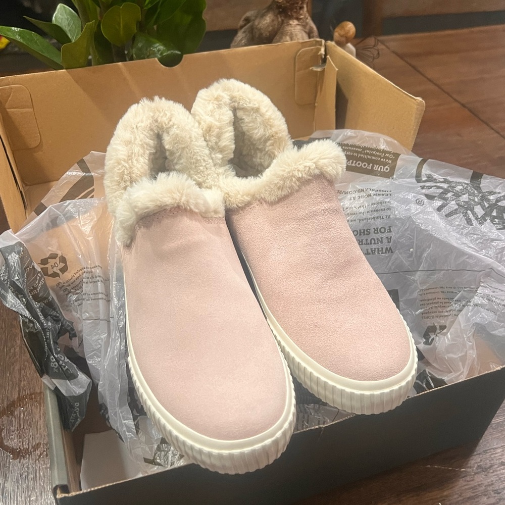 Timberlands - Light pink, suede women's faux fur-lined, easy slip on shoes.